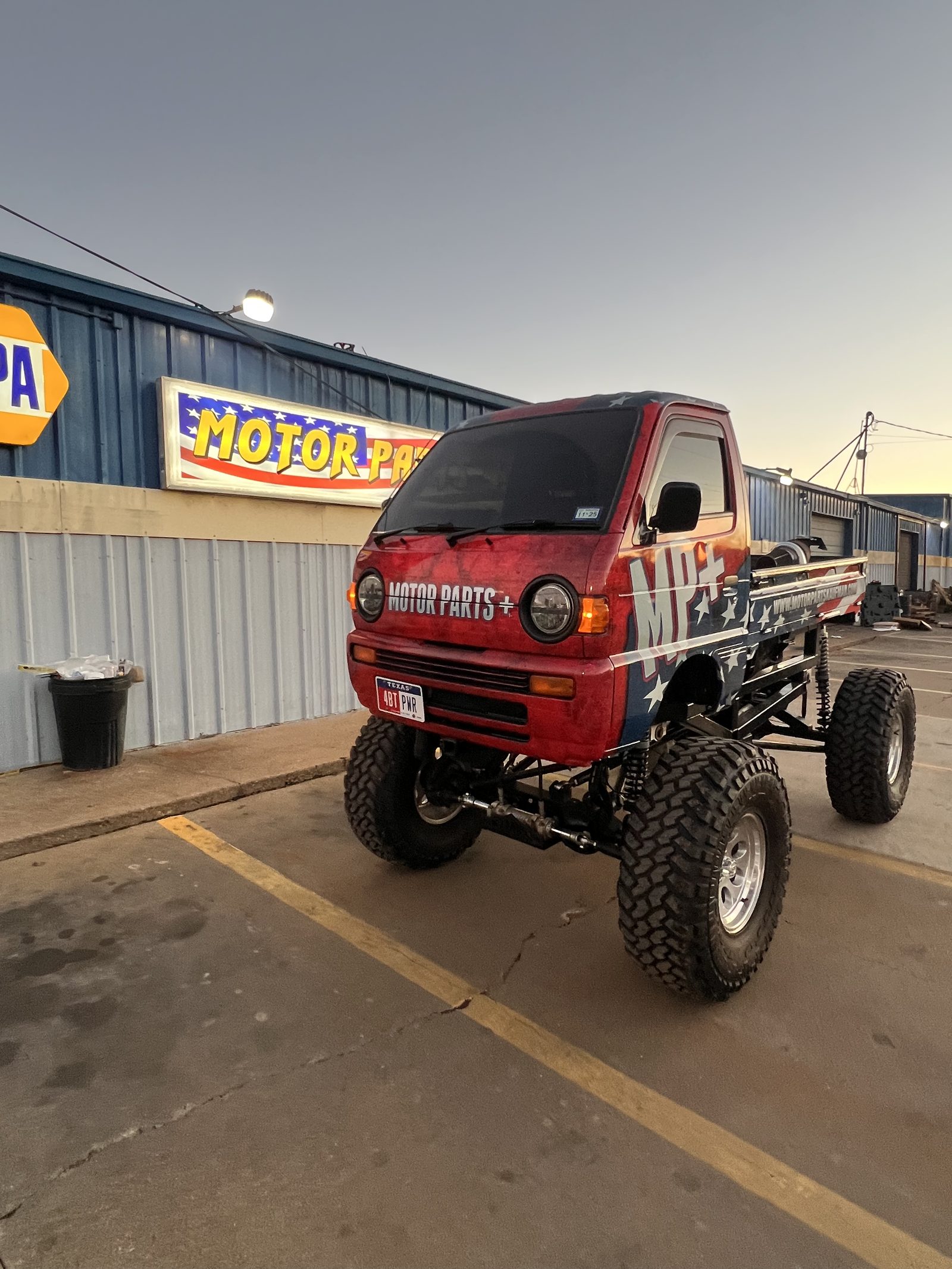 Custom Motor Parts + mini monster truck build outside the Kaufman, Texas shop