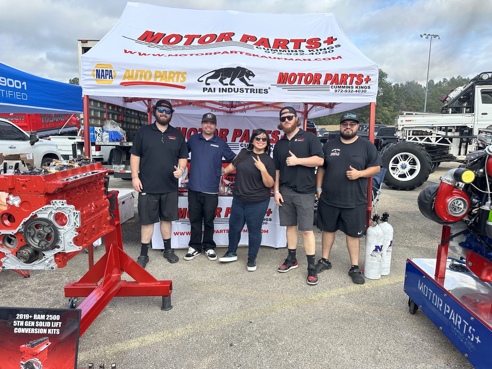 The Motor Parts + team at an event booth in Kaufman, Texas