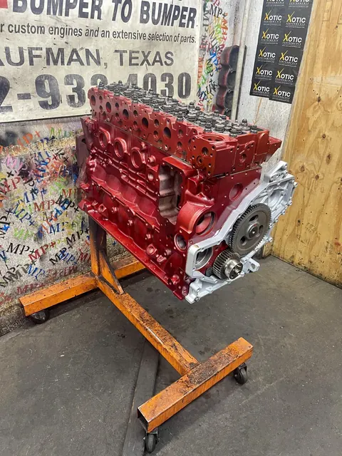 Red engine build on an orange stand