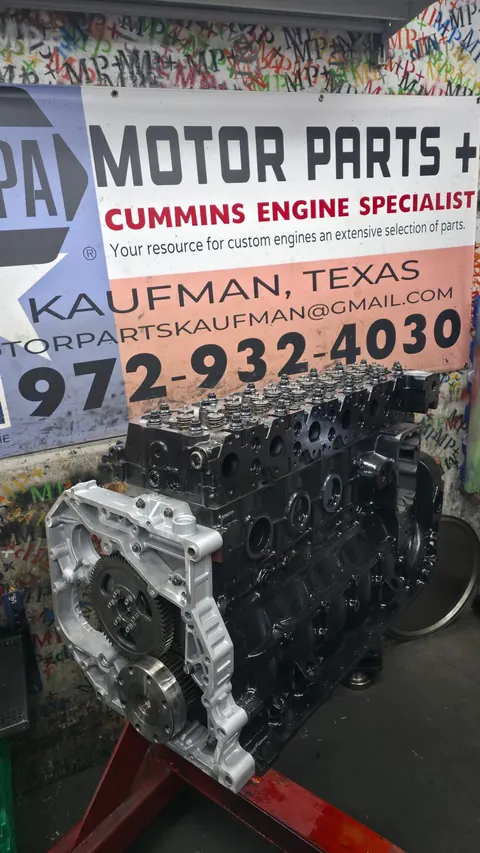 Black engine beneath the Motor Parts + banner