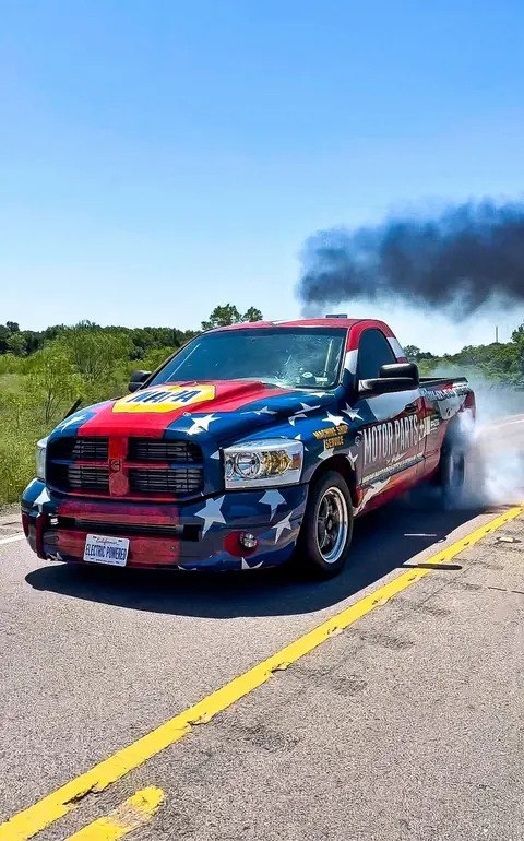 Motor Parts + truck at the track