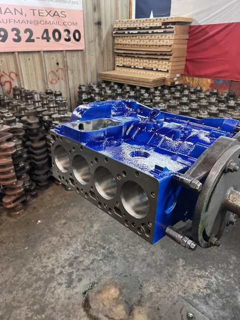 Blue engine build on a stand