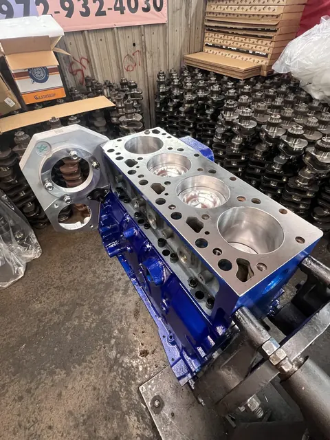 Pistons in a blue engine block