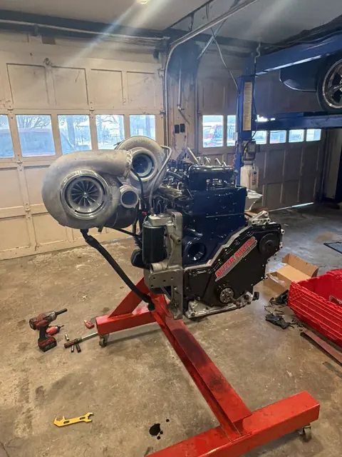 Turbocharged engine on a red stand