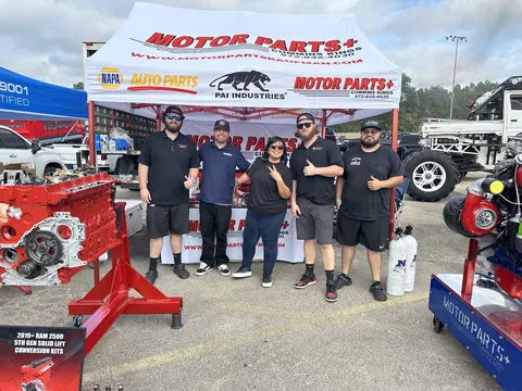 Group photo at the Motor Parts + event booth