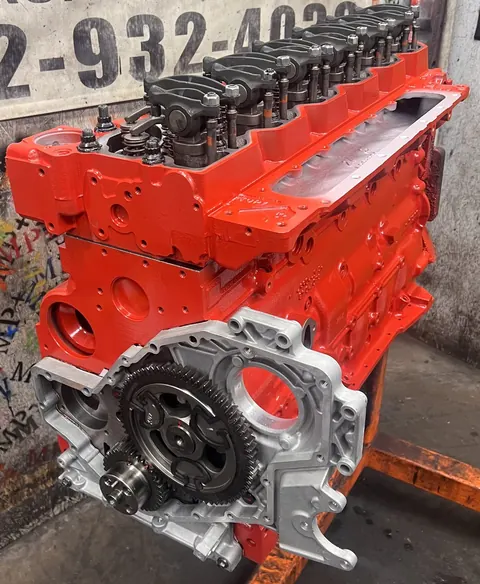 Red engine with a silver front cover