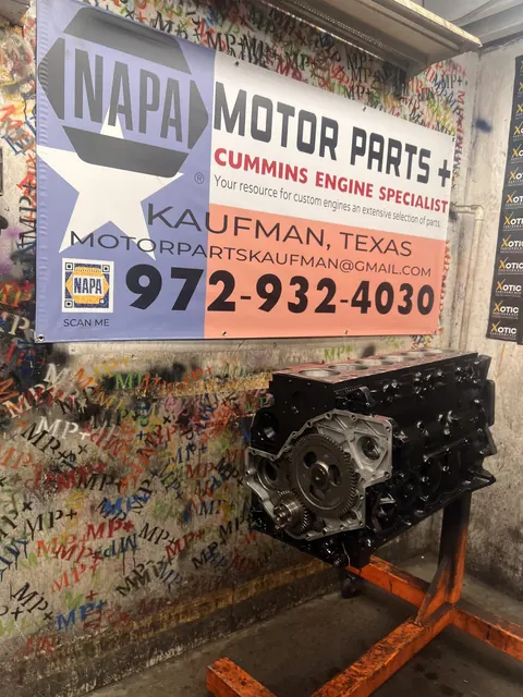 Black engine beneath the NAPA shop banner