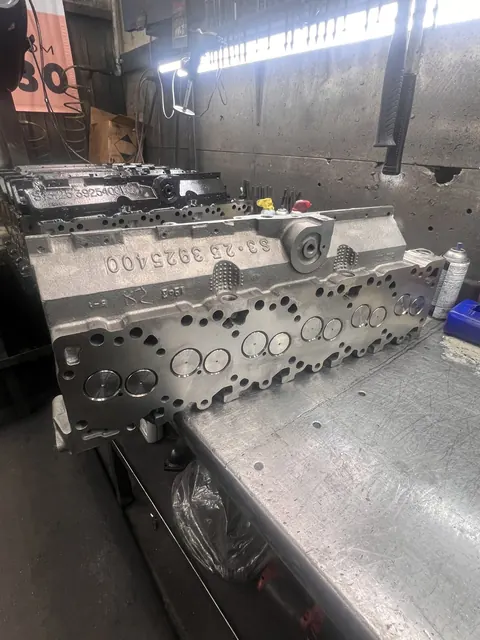Cylinder head on the machine-shop table