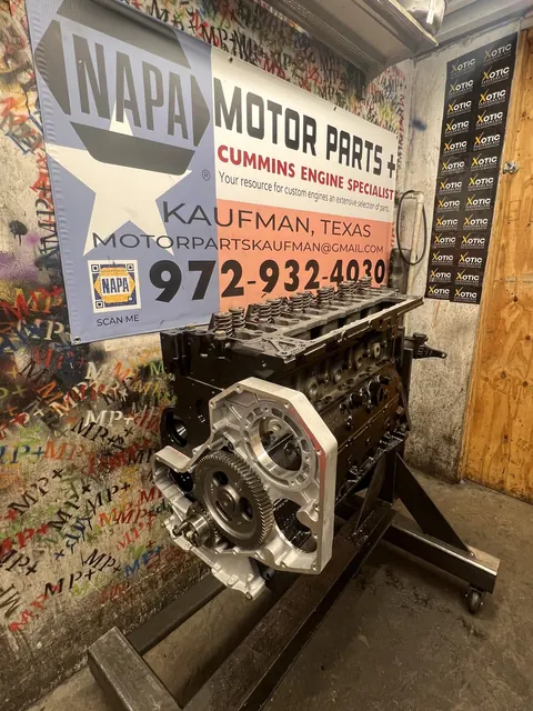 Engine assembly beneath the shop banner