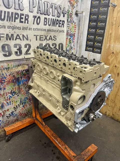 Tan engine build on an orange stand