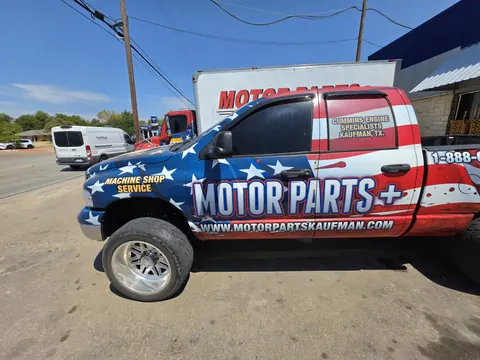 Motor Parts + pickup outside the shop